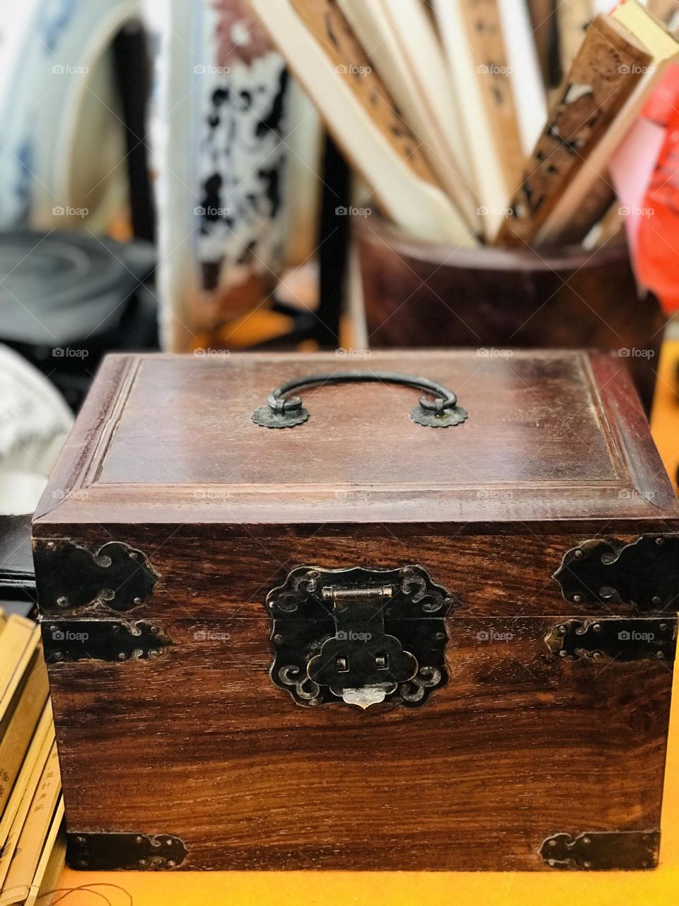 Beautiful ancient wooden box with metal holder 