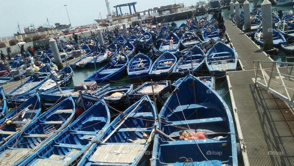 Beautiful blue boats in harbour at essaouira city in Morocco.