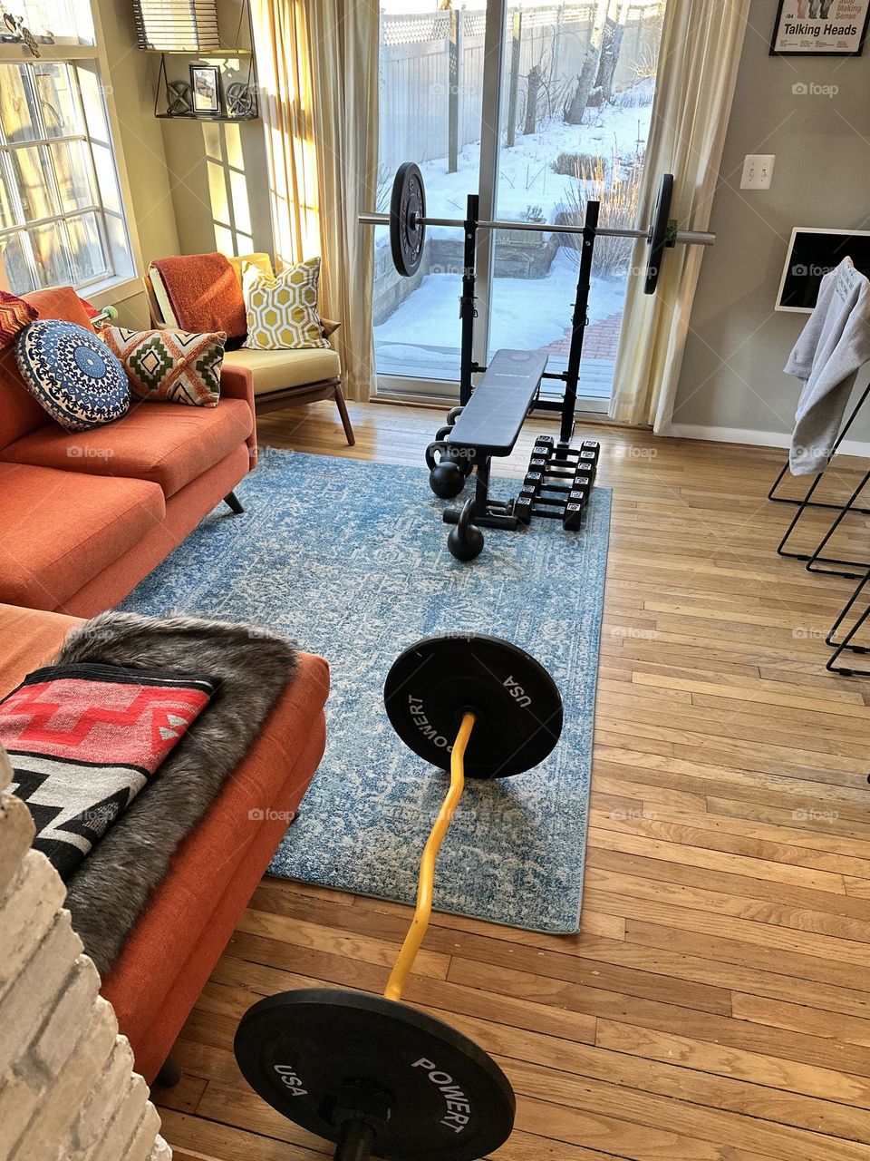 Working out in the living room, weights in the living room, focusing on your health, getting in shape with weights, fitness first