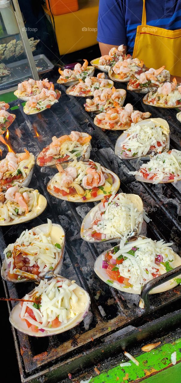 Seafood grilling in a shell