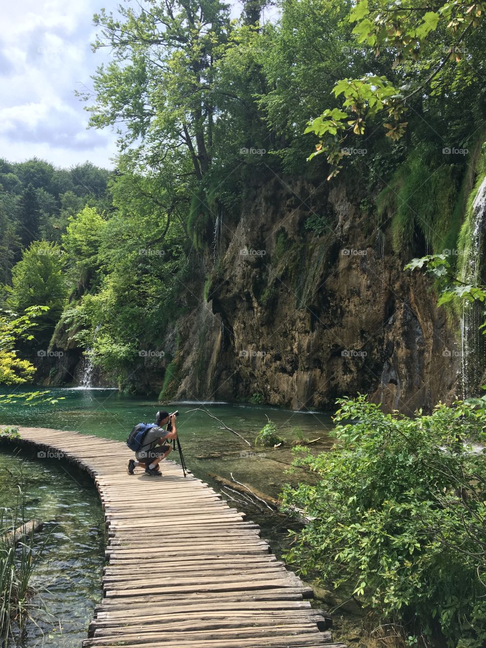 Man shooting a waterfall 