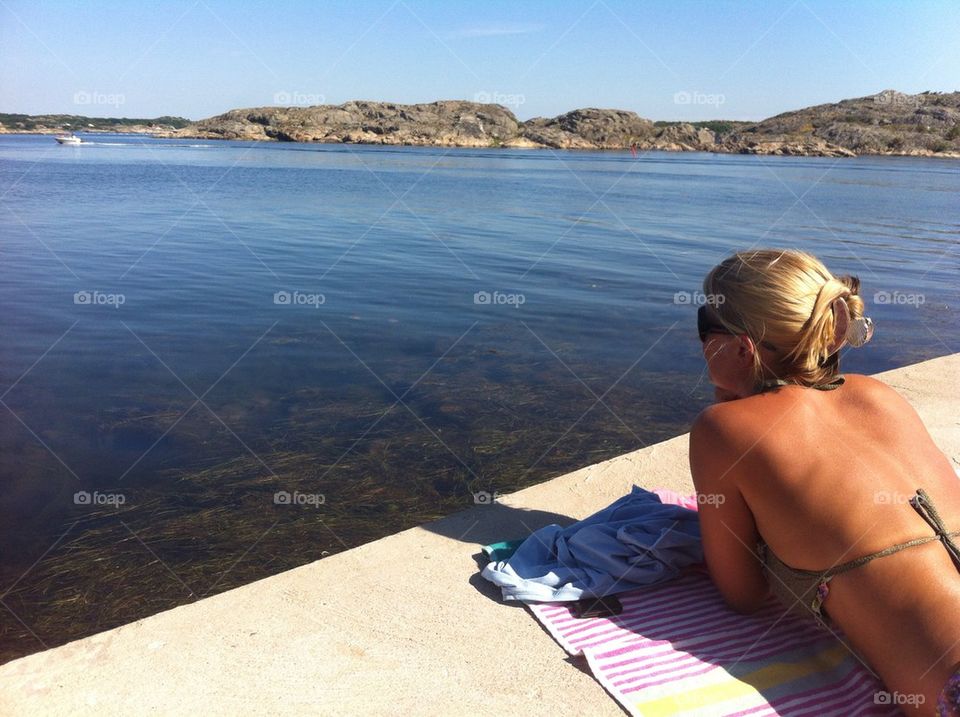 Summer. My friend at a trip to the sea
