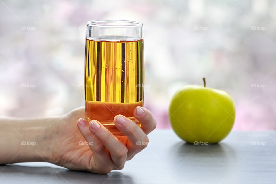 Close-up of  apple juice in glass