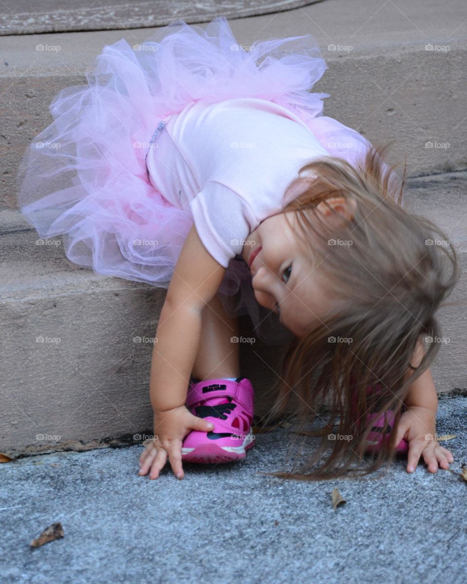 Child taking a ground view from a ground picture