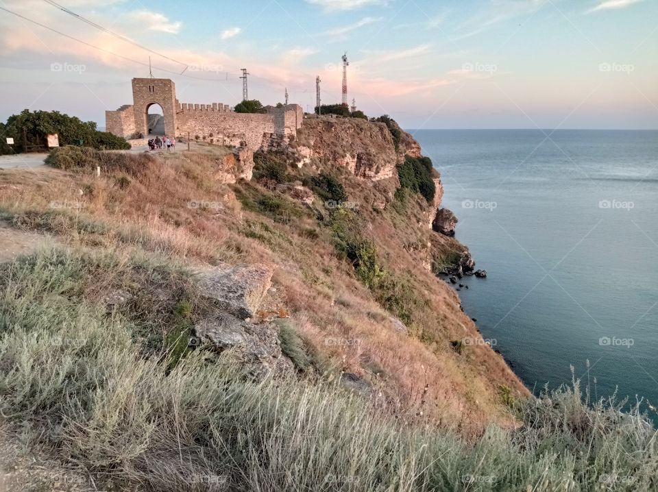 A fortress on a cliff over the sea