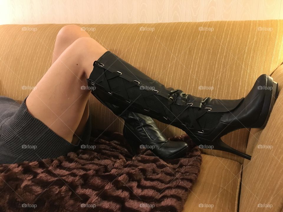 Sexy boots on couch