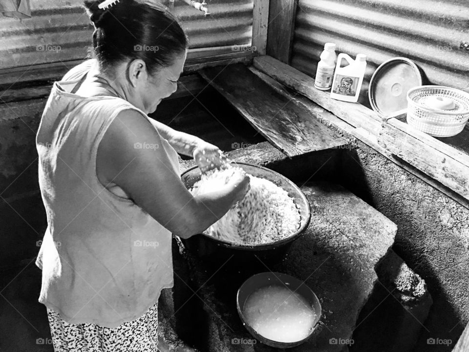 Prepping corn for tamales.