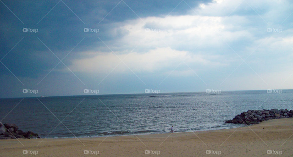 Person running on the ocean