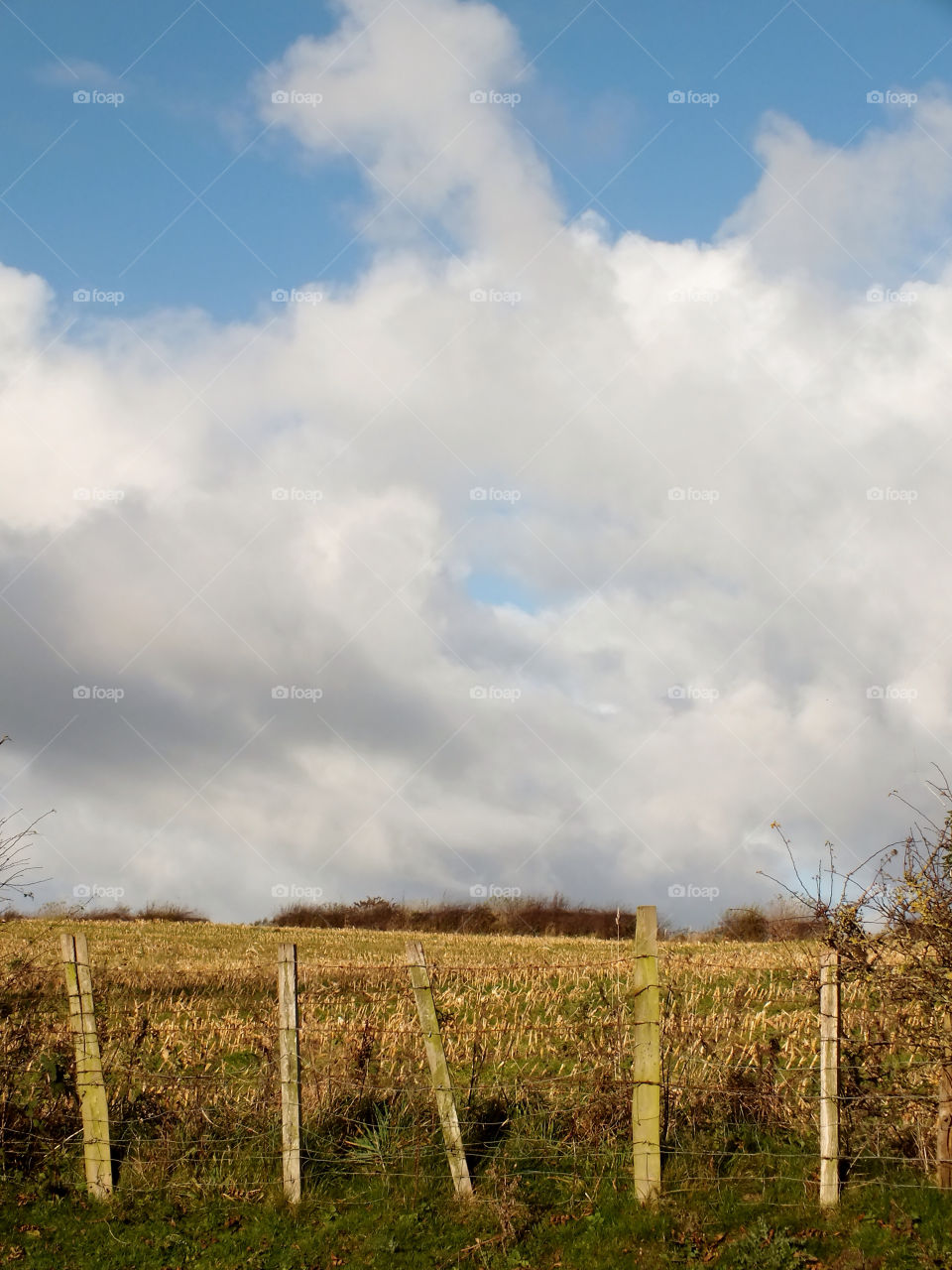 sky farmland fence clouds by emmam