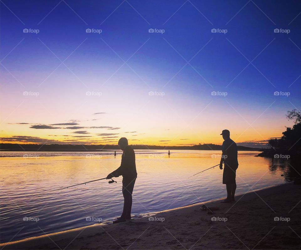 Still fishing in the purple evening light