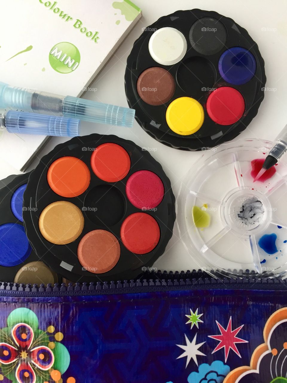 Arts & Crafts Supply - mini stacking travel watercolor  set,  water brushes, mini watercolor pad, and travel bag 