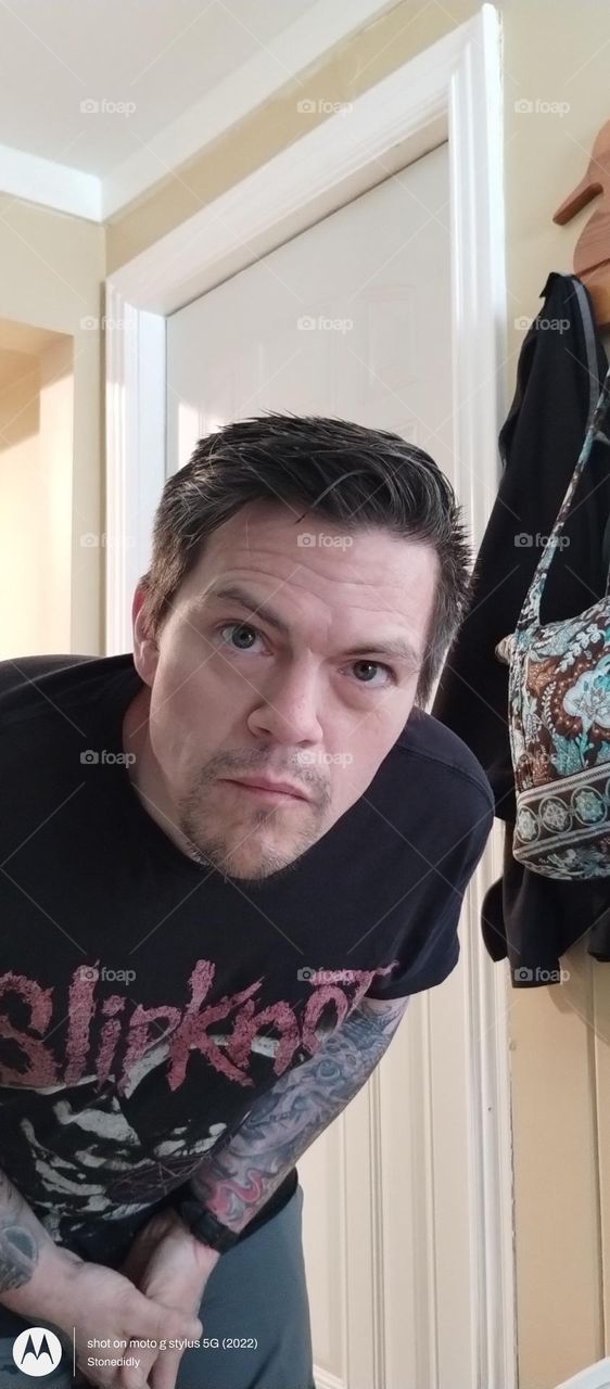 guy
brown hair man
man in black