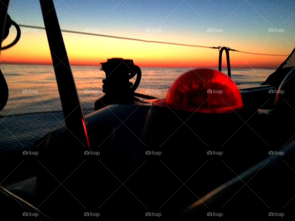 Sunrise on the Atlantic. Sunrise from a sailboat on an Atlantic Ocean mirror