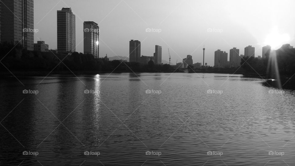 view of the building with a large lake