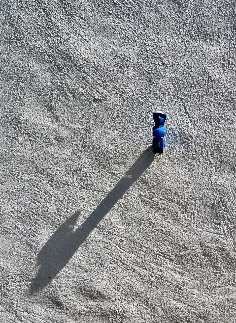 shadow on the wall of a window fastener