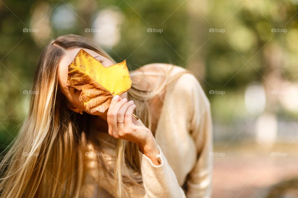 Happy woman at fall 