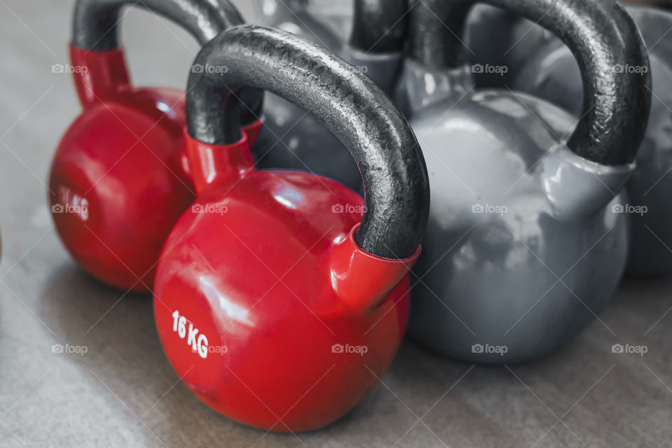 Red kettlebell close up view.  Fitness concept