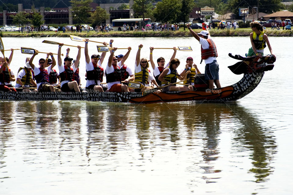 Dragon boat Race. People racing dragon boats on a lake