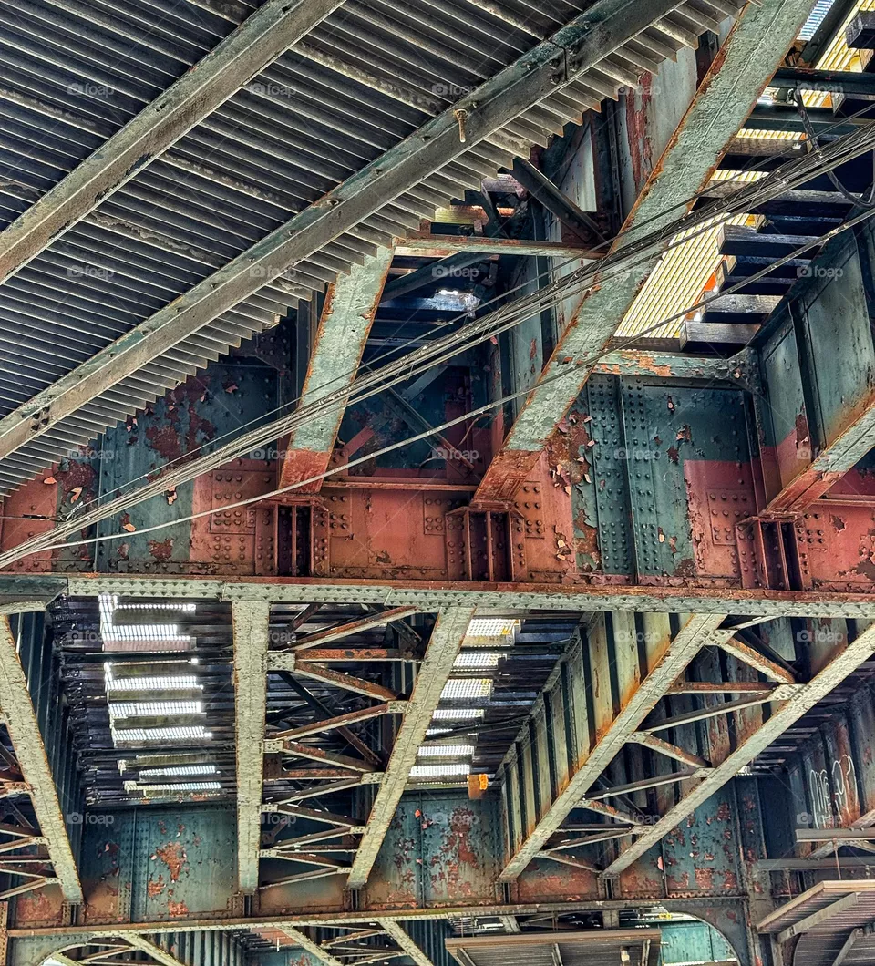 View of the underside of an elevated train track