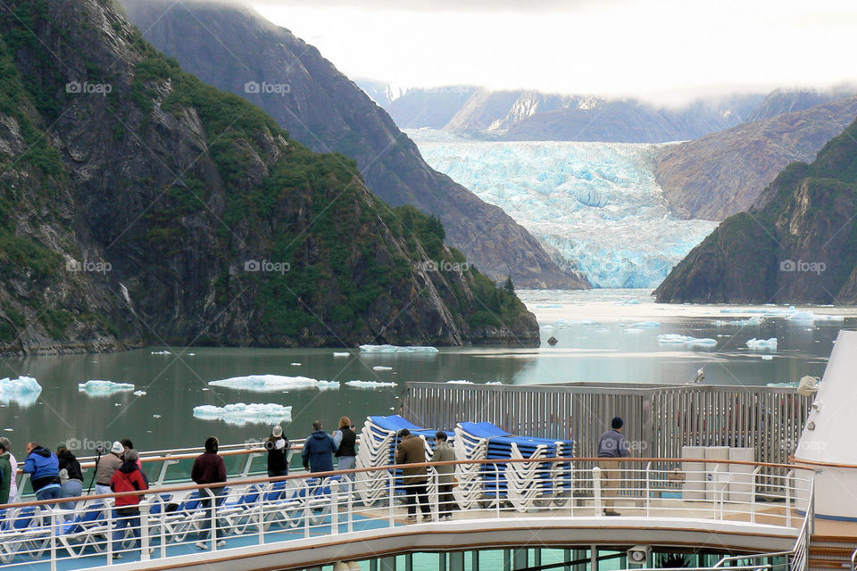 Tourists viewing Sawyer Glacier in Alaska's Tracy Arm fjord