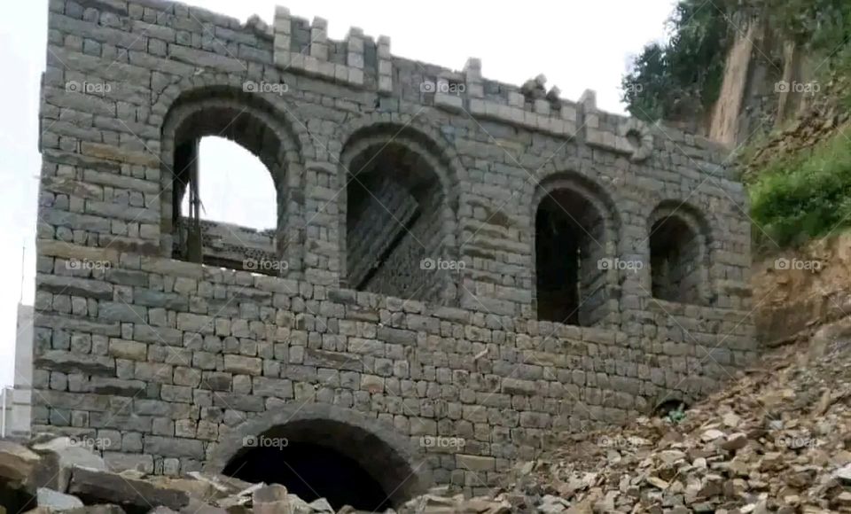 A stunning view of green mountains covered in fog in Yemen