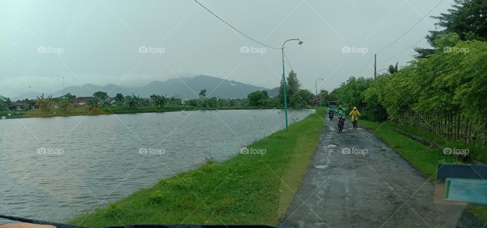 Reservoir landscape view with mountains in the background