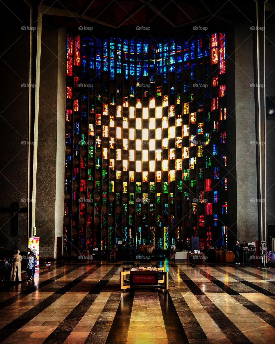 's Cathedral in Coventry. Beautiful glassart full of colours. Light is shining through and it's just mesmerizing.