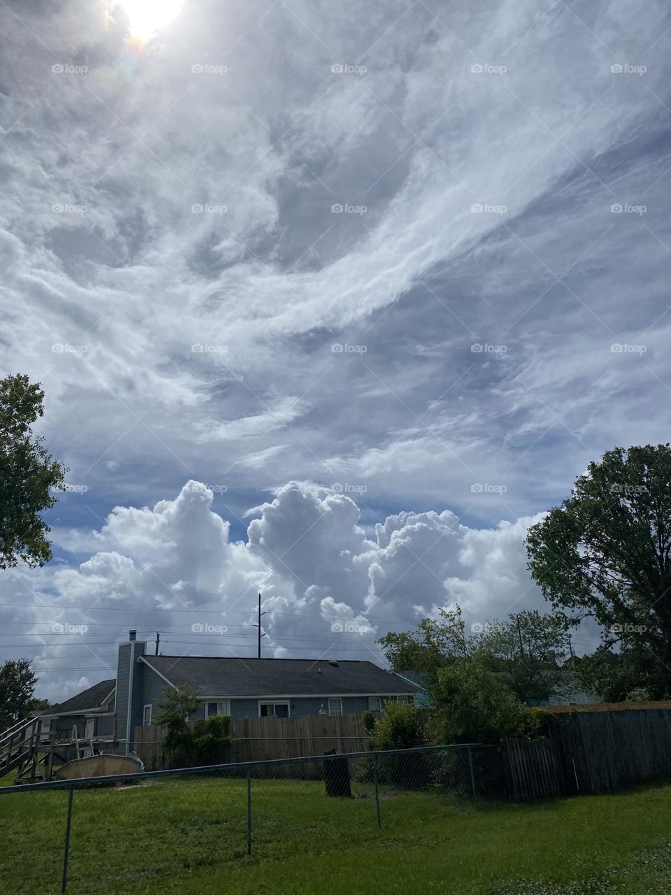 Large Puffy White Clouds in a beautiful Sky on a spring Day