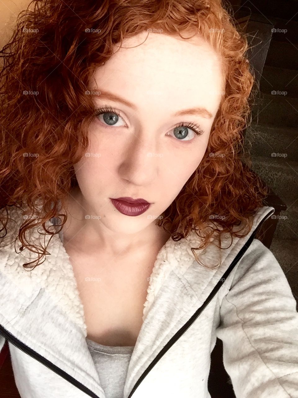 Natural pale redhead with dark lips 