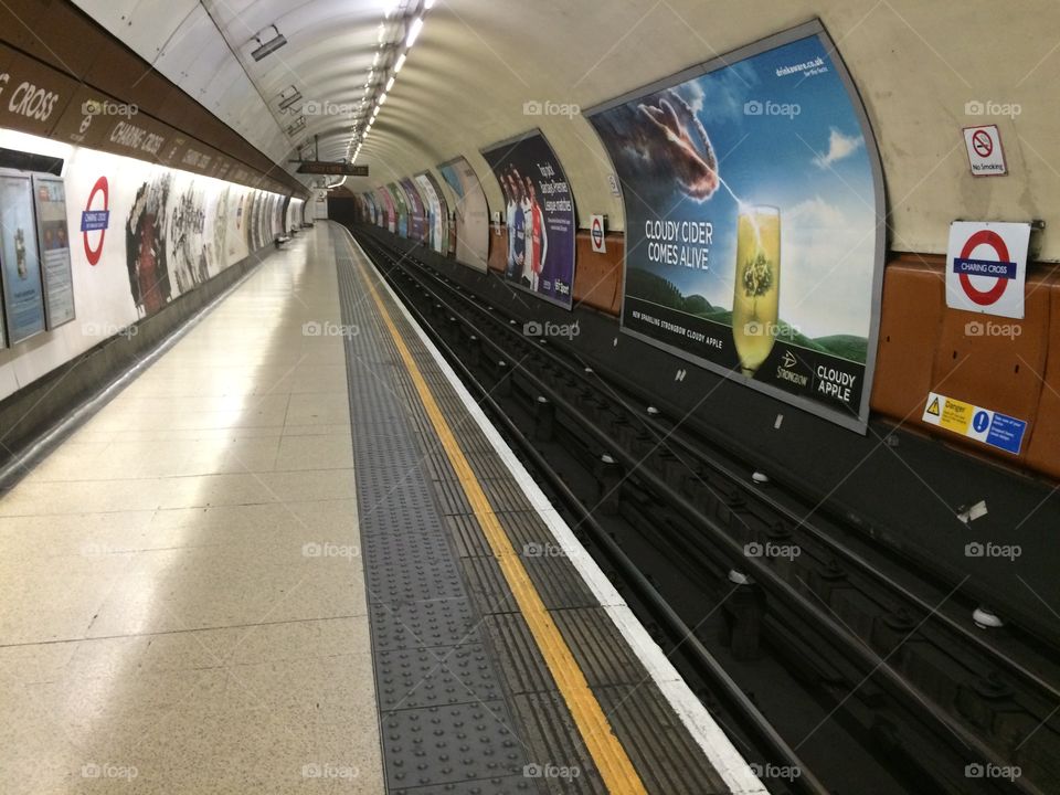 Train approaching . London Underground platform with train approaching 