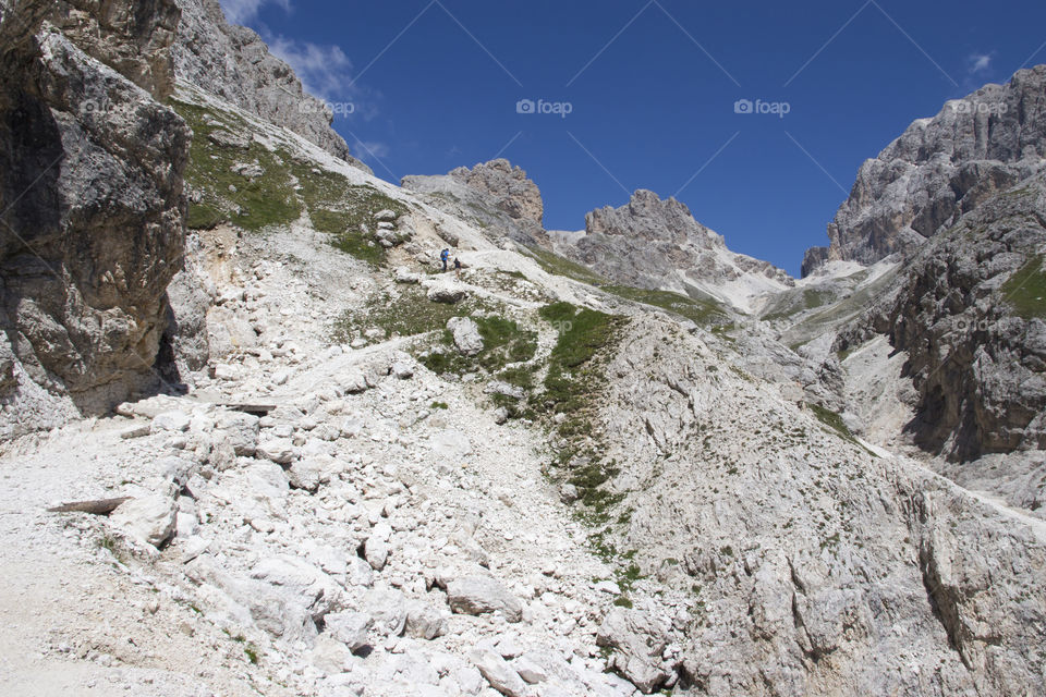 Steep rocky hiking trail to the mountain peak 