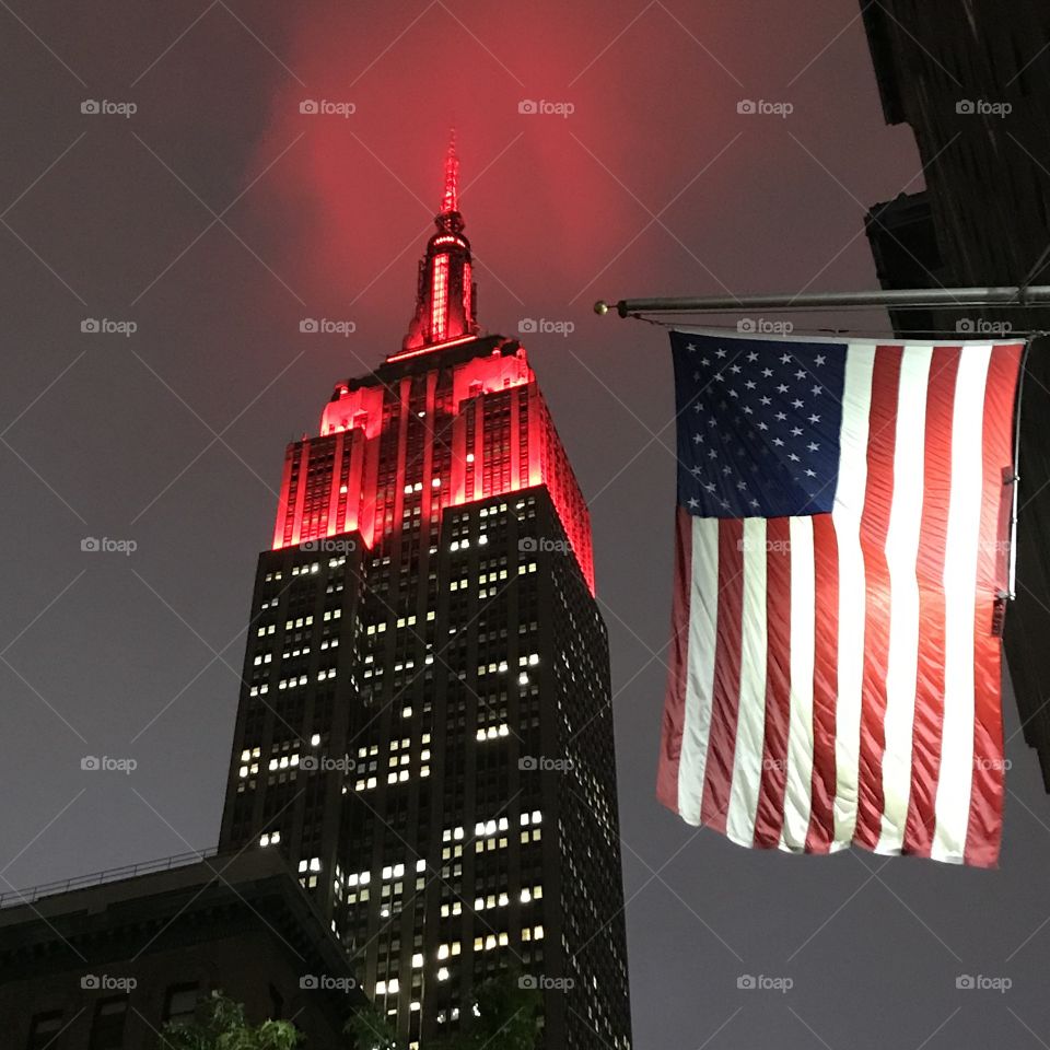 Empire State lit up with American flag in all its glory