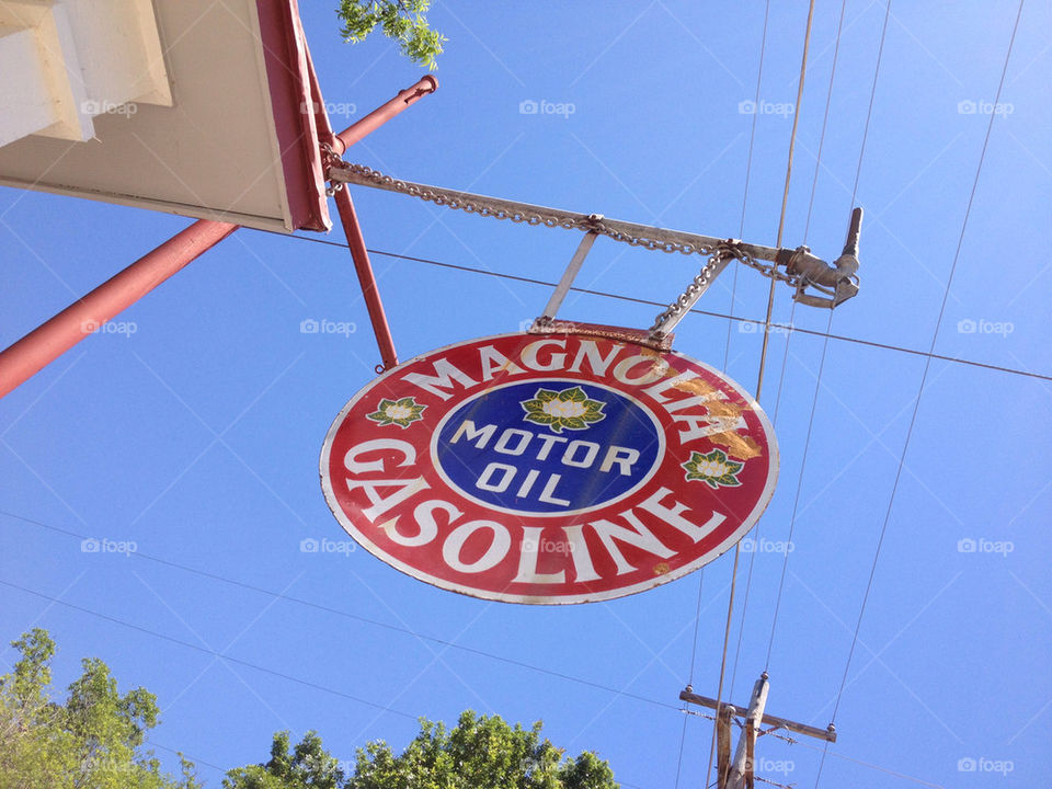 Magnolia Motor Oil and Gasoline vintage porcelain sign