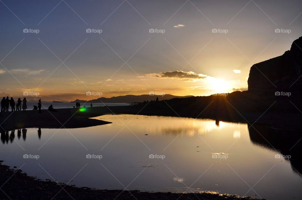 sunset over the namtso lake in Tibet