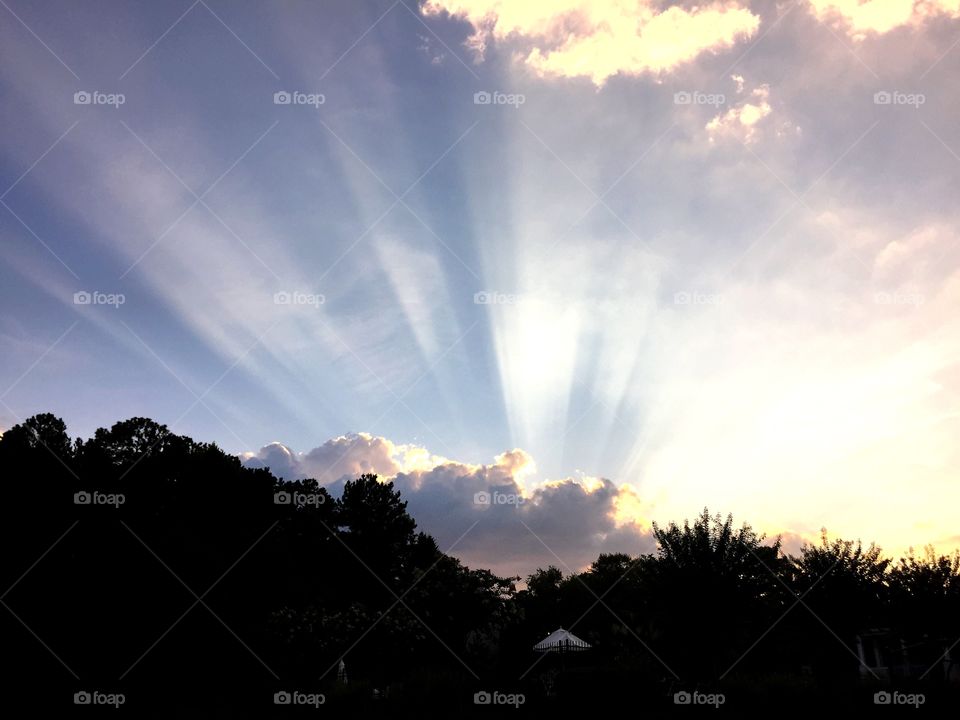 Sun rays. Out for a walk and saw the sun beams penetrating the clouds and found it uplifting 