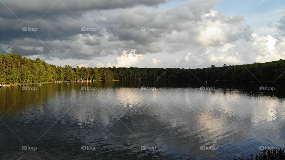 A peaceful day on the lake. Fluffy clouds rolling by.
