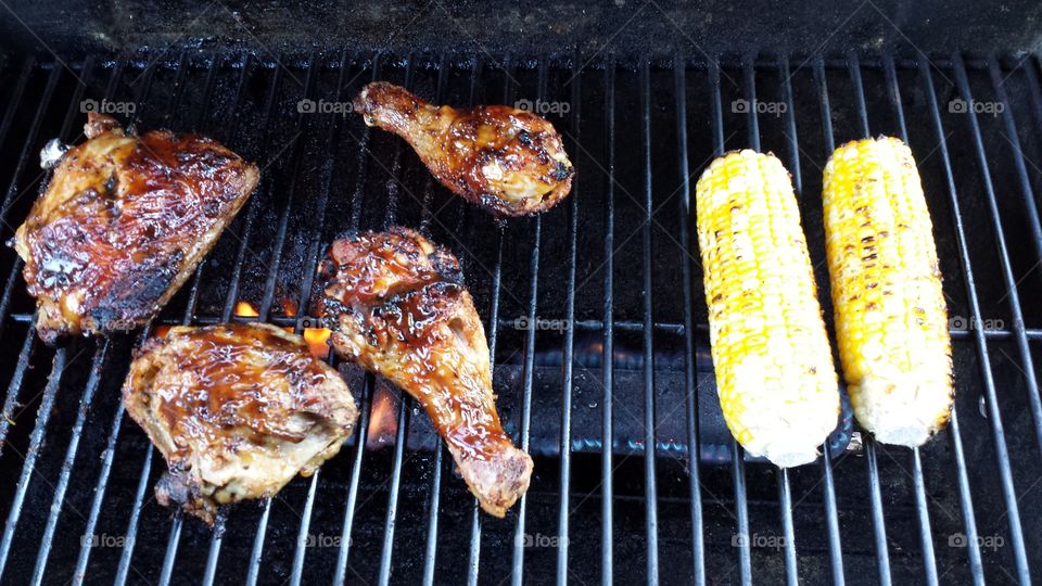 Grilling. Chicken and corn on the cob