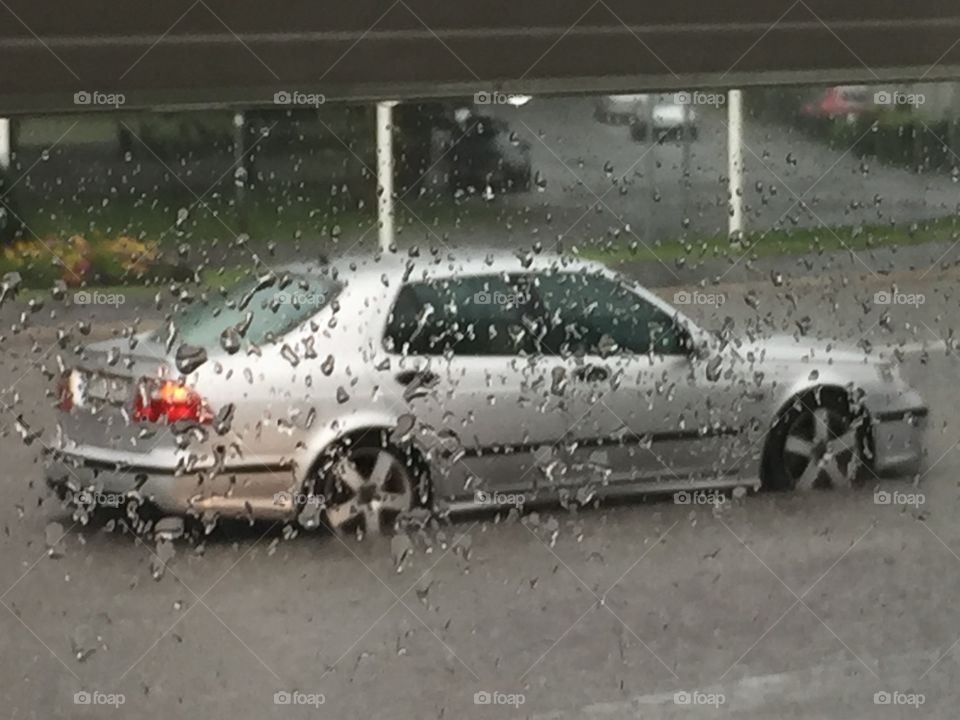 Car in heavy rain 