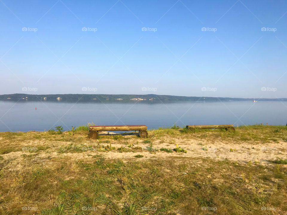 Wooden bench near the lake 
