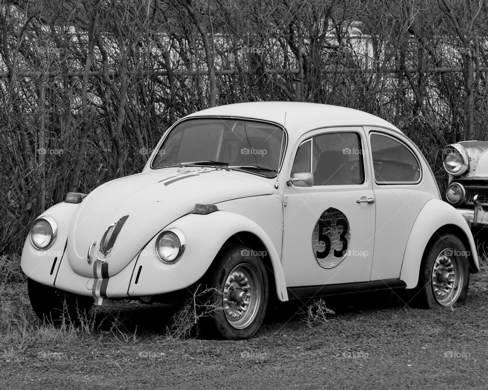 A Love Bug style Volkswagen Bug retired and rusting away in Prineville, Oregon. 