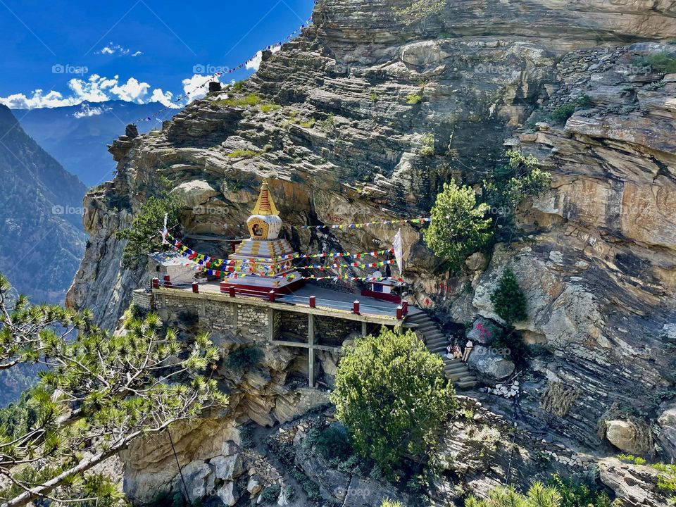 Budhisht statue under the rock in mountain 
