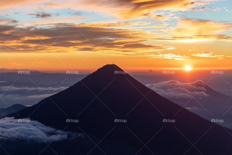 Volcan de agua at colorful sunrise.