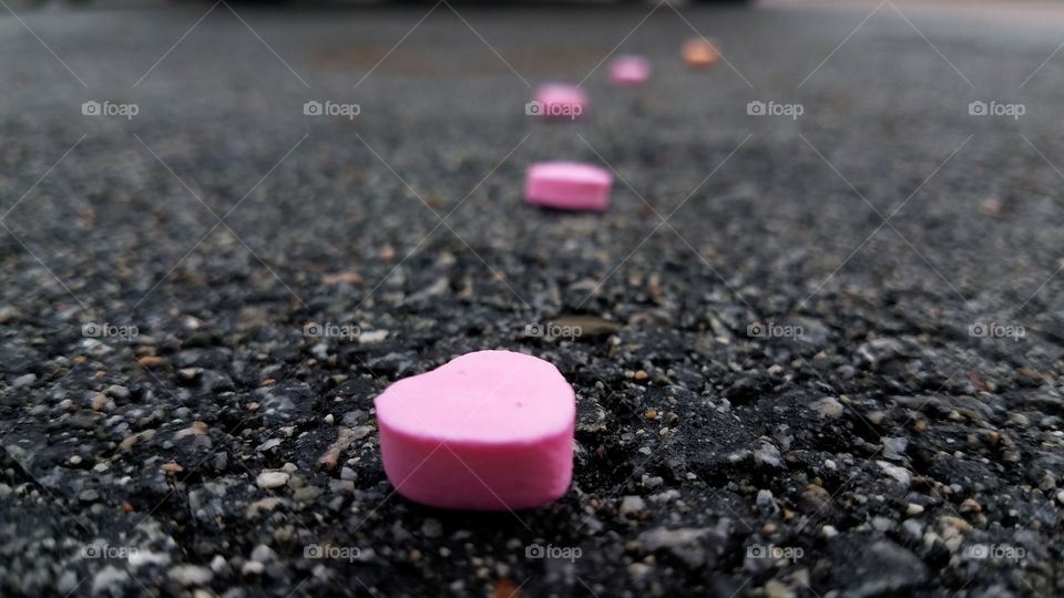 Close-up of pink heart shape candy
