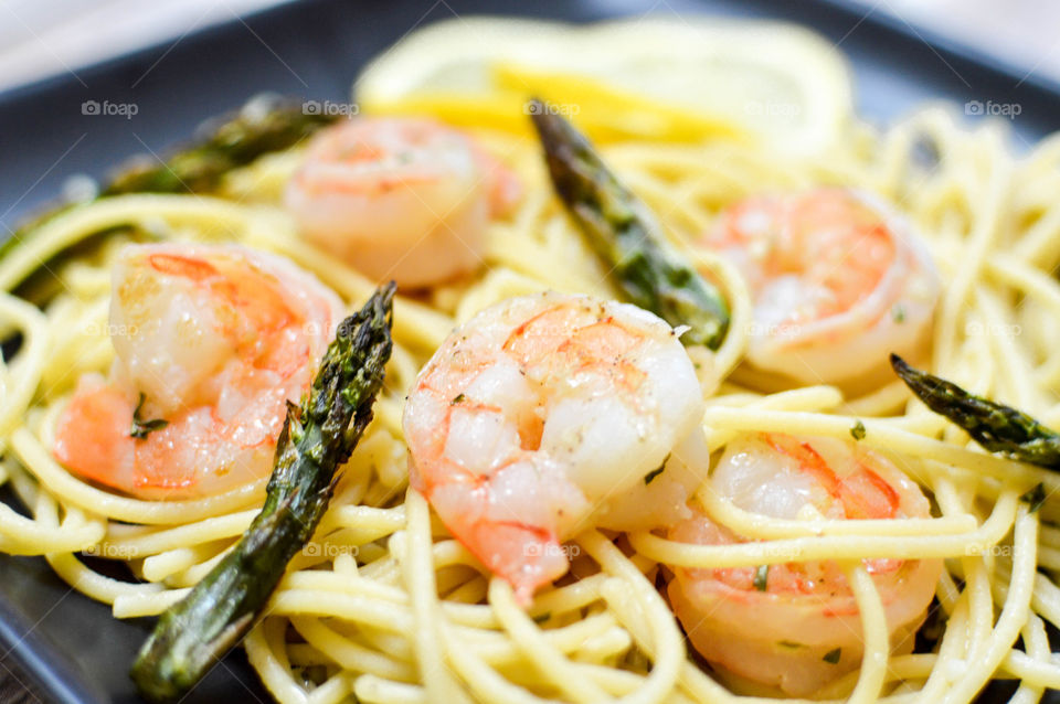 Close-up of spaghetti pasta with shrimp