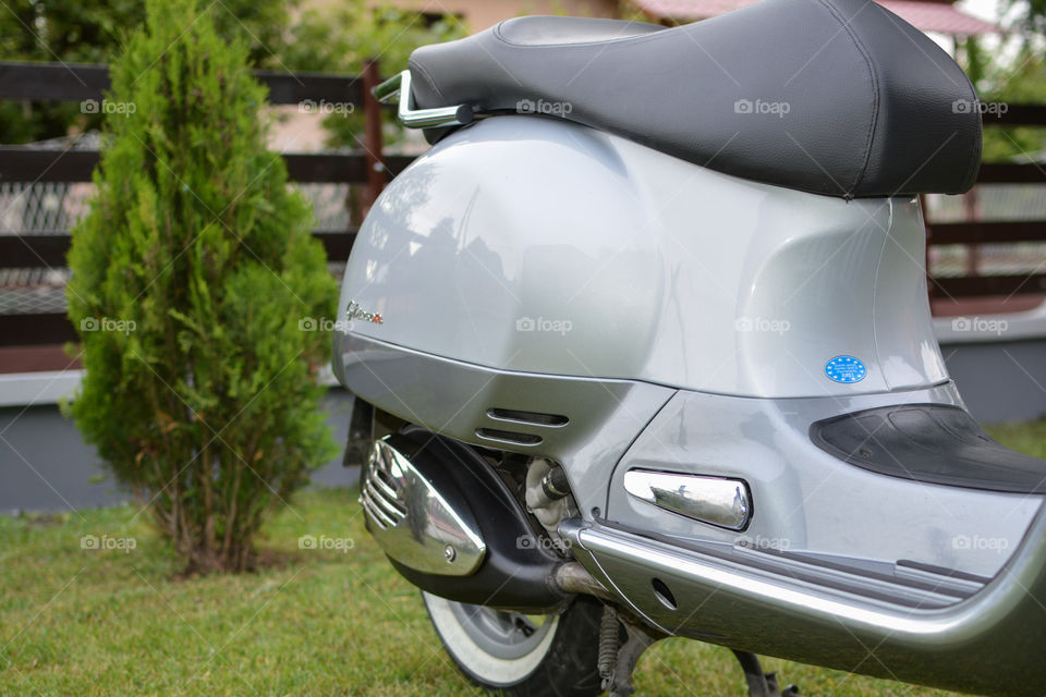 grey vespa motorcycle, italian style