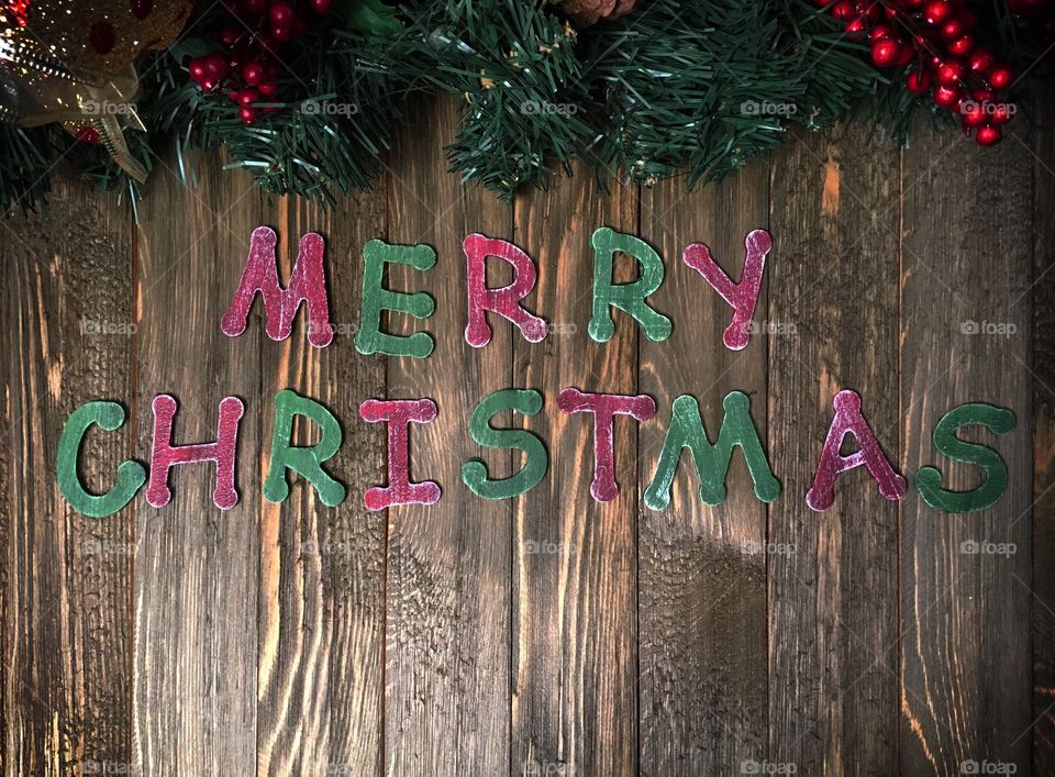Rustic craft wooden merry Christmas sign with space for copy