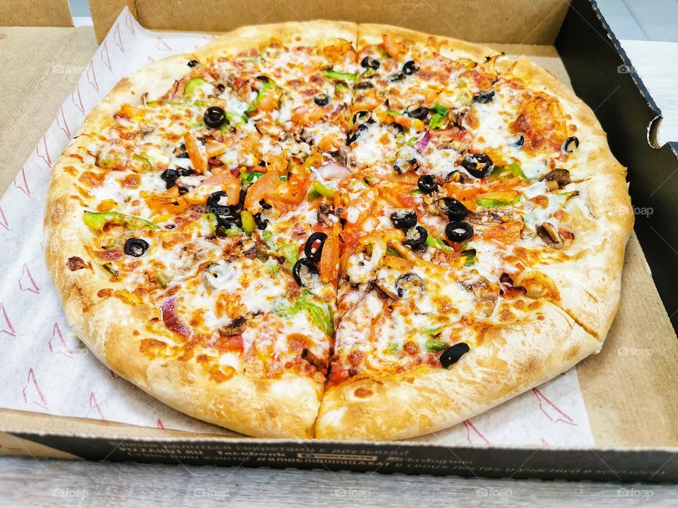 Pizza food yummy served table day part tea time