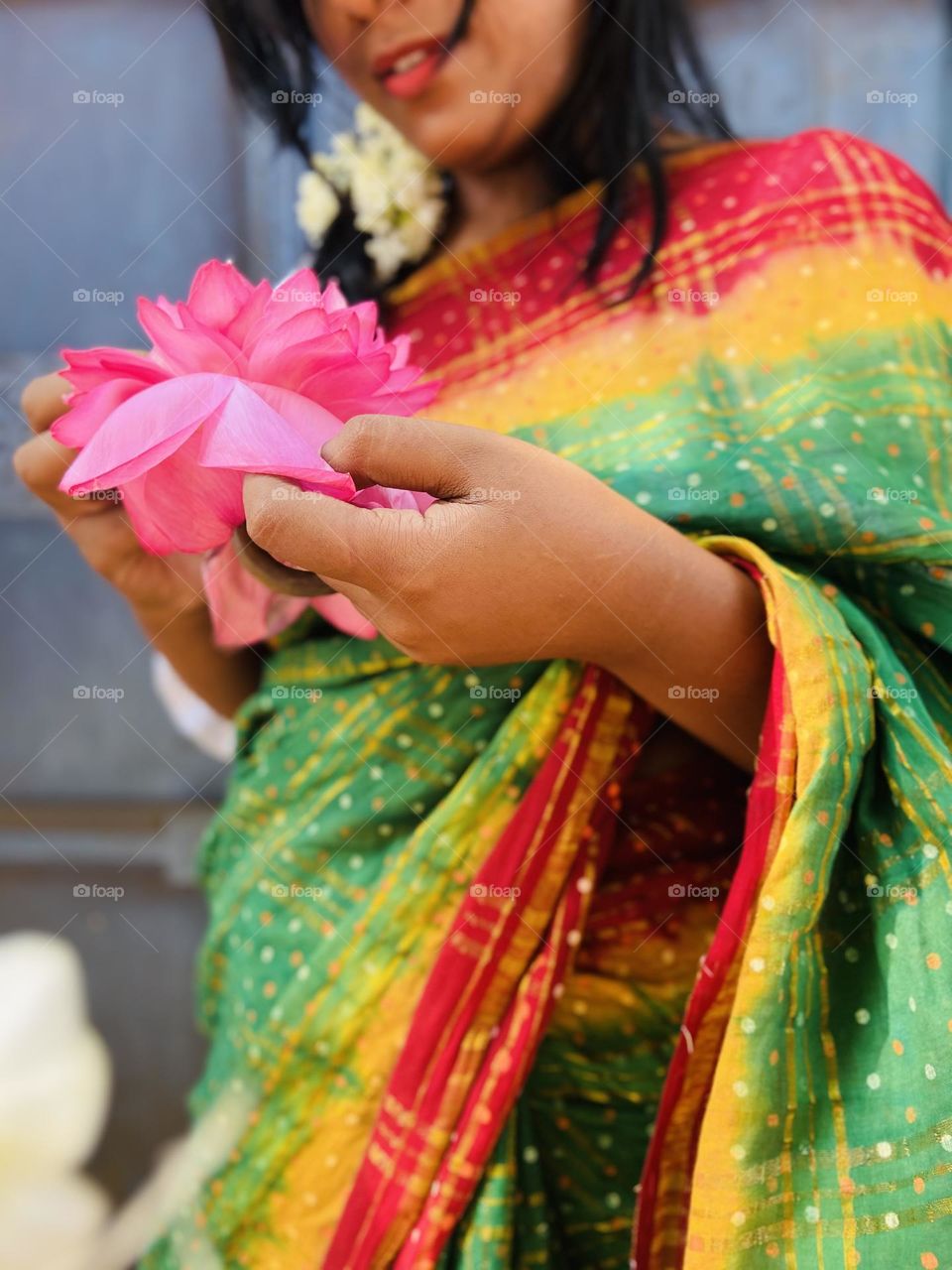 Lotus and saree are both love to me . Actually getting a bunch of lotus would make me happy .