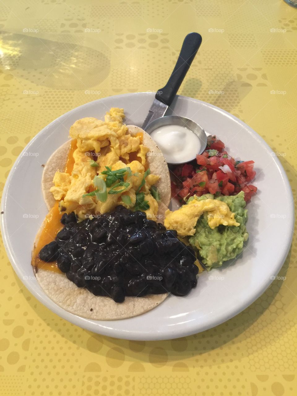 A good way to start your day, with a good serving of heuvos rancheros; a wonderfully balanced meal!