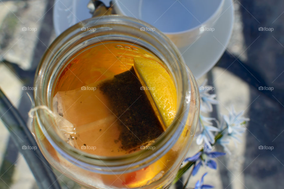 High angle view of green tea in jar